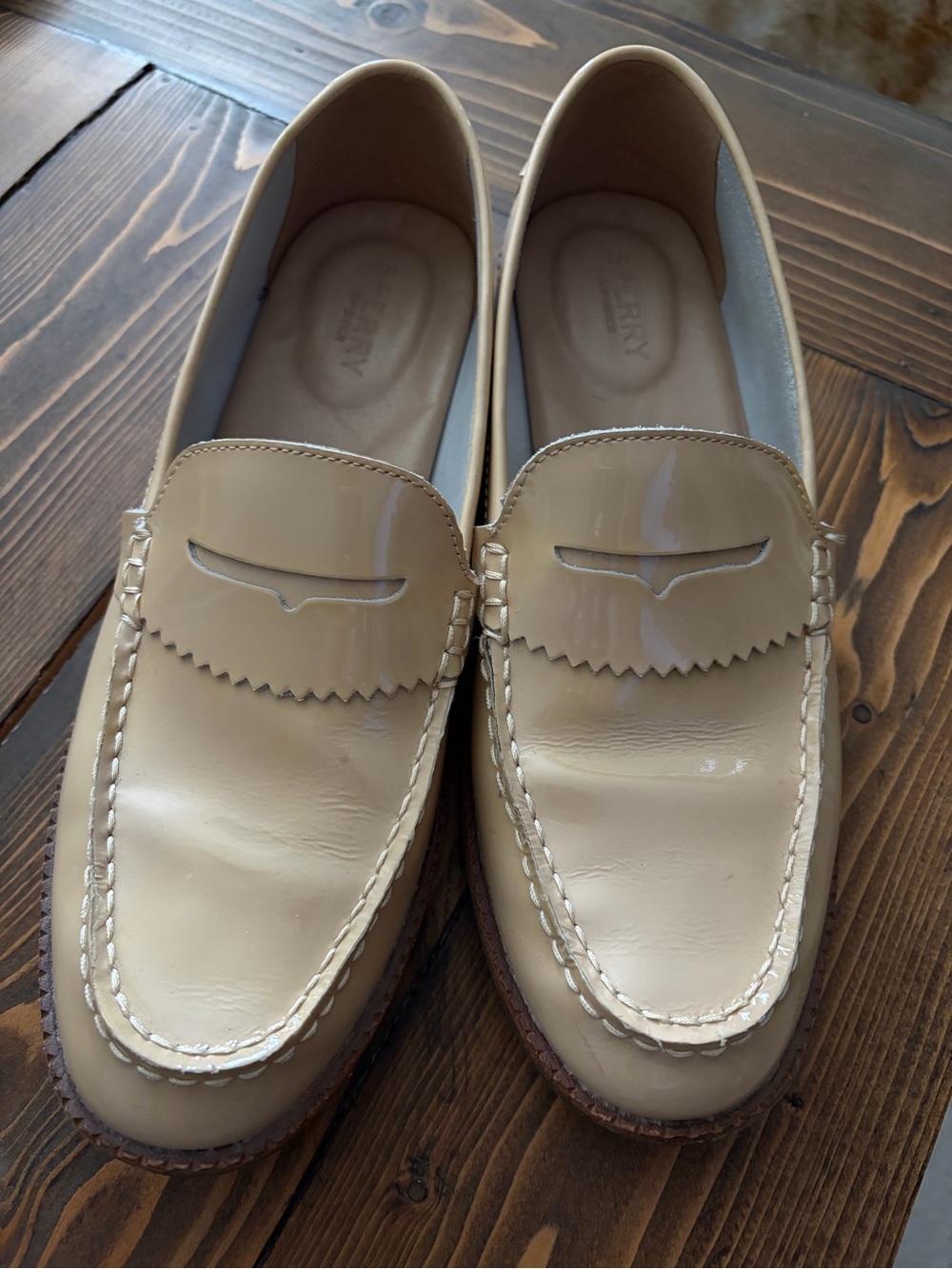 Women’s Sperry Beige Patent Leather Penny Loafers.